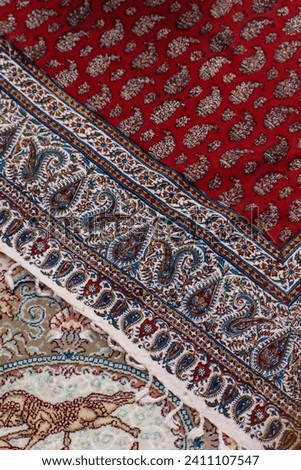 A captivating close-up of a Persian rug. This photo unveils the intricate beauty and craftsmanship of a traditional Persian rug in a captivating close-up.