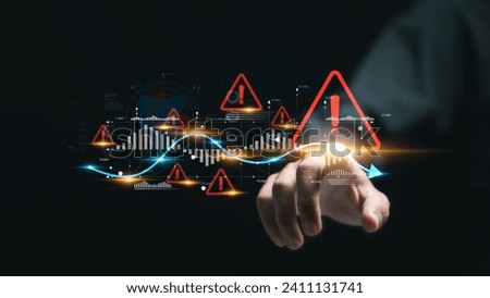 Businessman touching virtual world economic growth chart with red warning sign for caution in investing economic situation warning, Business investment risks.