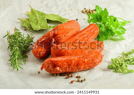 Fresh sausage with aromatic herbs and peppercorns
