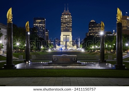 Golden Wings and Monument with Indianapolis Skyline at Night