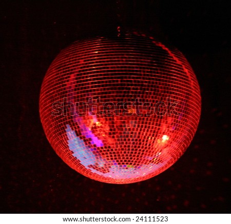 night club lighting red mirror-ball over black