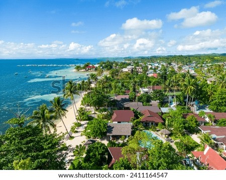 Philippines Aerial View. General Luna Town. Tropical Island Turquoise Blue Sea Water. Siargao Island, Philippines, Southeast Asia. Royalty-Free Stock Photo #2411164547
