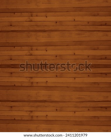 Wooden boards, lumber, industrial wood, timber. Pine wood timber. Rough spruce and pine lumber pile at a sawmill. Pile of wooden boards at lumber production factory. beams,  plank background. material Royalty-Free Stock Photo #2411201979