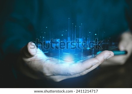Technology hologram and visual screen,  Business people show hologram of smart city, Digital accesses.  Royalty-Free Stock Photo #2411214717