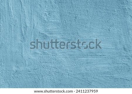 Abstract Grunge light blue stucco wall background. Artistic creative Texture. Pale Cyan Stylized Backdrop For for design.