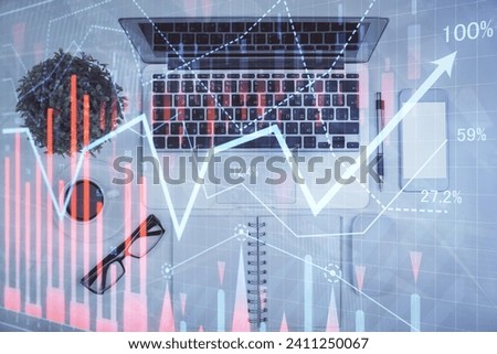 Multi exposure of forex chart drawing over table background with computer. Concept of financial research and analysis. Top view.