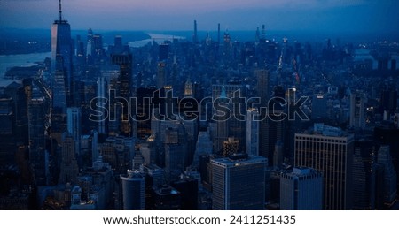 Scenic Aerial New York City View Towards Lower Manhattan Architecture. Panoramic Evening Photo of Wall Street Financial District from a Helicopter. Cityscape with Office Buildings and Skyscrapers