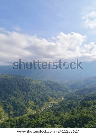 Cloud view from atop the mountain view in Shillong during the charming morning times. Royalty-Free Stock Photo #2411253627