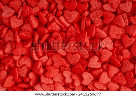 Red hearts background. Sweet candy hearts as background. Valentines day background