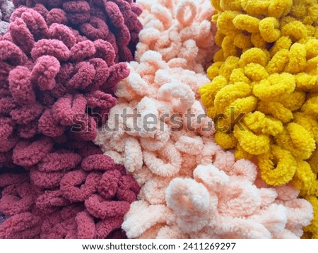 Colorful knitted woolen scarf background. Knitted woolen scarf background