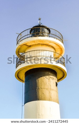 lighthouse on background of blue sky, photo as a background, digital image