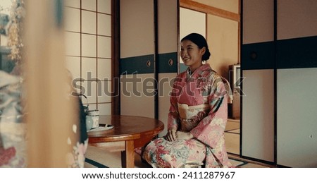 Woman, tea ceremony and Japanese traditional in tatami room for religious culture, respect or ritual. Asian person, kneel and kimono practice or warm drink for mindfulness healing, worship or holy Royalty-Free Stock Photo #2411287967
