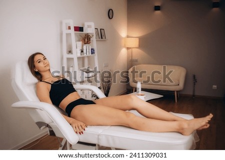 Female patient is waiting for the procedure in the spa salon. High quality photo