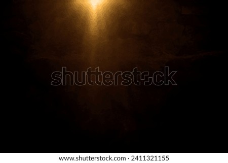 golden sun light effect. Glowing sunrays on black background. Light rays or sun beam vector background. Abstract gold light sparkle flash spotlight backdrop with yellow, gold sunlight shine on black  Royalty-Free Stock Photo #2411321155