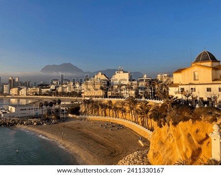 Stunning view of the famous Benidorm resort town with skyscrapers buildings and beautiful beach coast 