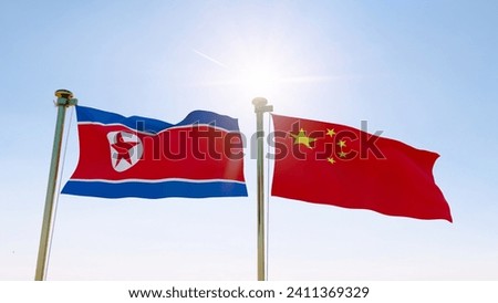 North Korea and China flags waving against a blue sky. 4K ULTRA HD. 
