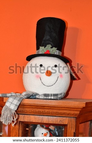 Snowman decoration on a shelf