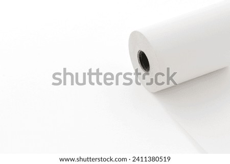 unwound paper roll, copy space, isolated on white background	 Royalty-Free Stock Photo #2411380519
