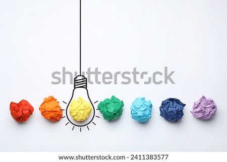 Idea. Illustration of light bulb around crumpled paper ball on white background, flat lay