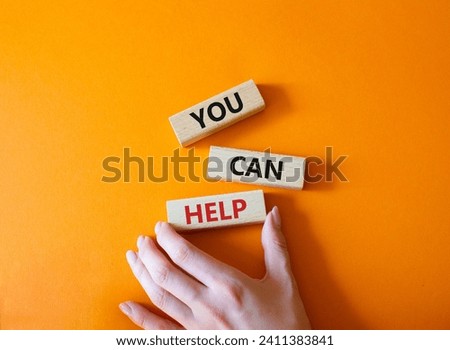 Words have power symbol. Wooden blocks with words Words have power. Beautiful orange background. Businessman hand. Business and Words have power concept. Copy space.