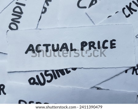 Actual price on paper background. Royalty-Free Stock Photo #2411390479