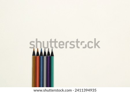 Set of color pencils isolated on white background