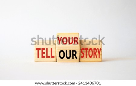 Tell Your or Our story symbol. Wooden cubes with words Tell Our story and Tell Your story. Beautiful white background. Business concept. Copy space Royalty-Free Stock Photo #2411406701