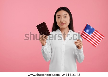 Immigration to United States of America. Woman with passport and flag on pink background, space for text