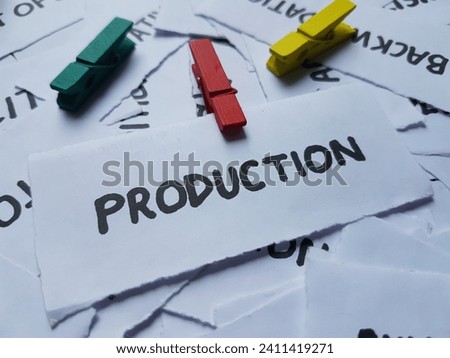 Production writting on paper background.