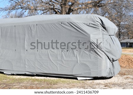 Protective cover on a recreational vehicle Royalty-Free Stock Photo #2411436709