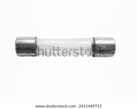 Electric fuses close-up isolated on white​ background.​ Quick Safety Device to protect electronic equipment from overload and short circuit in the electrical system. Royalty-Free Stock Photo #2411449715