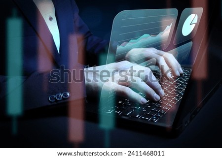 Businessman in suit working on business stocks and shares on laptop, growth data chart with diagram, report on company investment progress, quarterly report