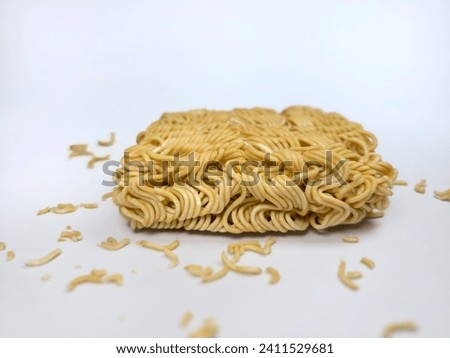 Asian dry instant noodles on white background .