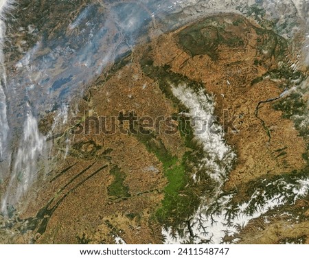 Fires in central Russia. Fires in central Russia. Elements of this image furnished by NASA. Royalty-Free Stock Photo #2411548747