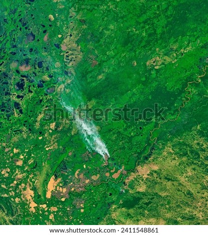 Fire in the Pantanal. Even during the wet season, fires can burn in the large wetland region in southwestern Brazil. Elements of this image furnished by NASA.