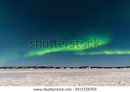 Aurora Borealis, Northern Lights, at Yellowknife, Northwest Territories, Canada Royalty-Free Stock Photo #2411558703