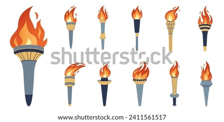 Flaming torches set. Cartoon torch withe flame. Burning fire or flame. Sport fire sign. Competitions, athletic, champion, sports game or freedom torches with flames icon. Royalty-Free Stock Photo #2411561517