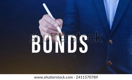 Businessman clicks bonds virtual screen. Bond Finance Banking Technology concept, Trade Market Network, bond security that indicates the investor has provided loan issuer, Equivalent loan, Royalty-Free Stock Photo #2411570789