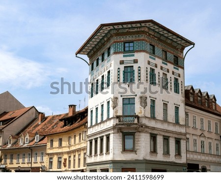 Hauptmann House, beautiful building located in  Prešeren square (Prešernov trg) in front of Franciscan Church of the Annunciation Ljubljana, Slovenia.  Royalty-Free Stock Photo #2411598699
