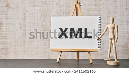 There is wood block with the word XML. It is as an eye-catching image.