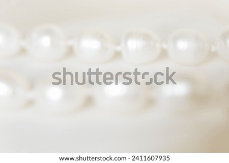 Soft Neutral Textured Background of Pearls With Copy Space