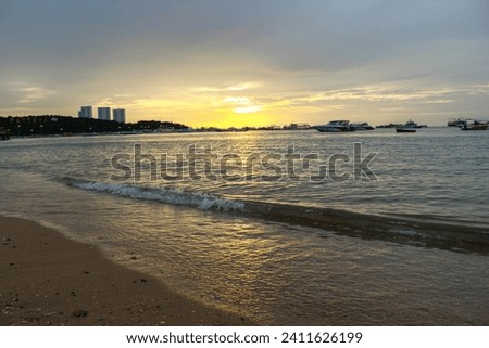 Beaches in Asia, Thailand, Pattaya, the sea at the time of sunset on the beach in the evening On the day that there is a calm wind wave