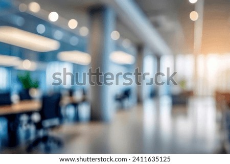 Blurred empty open space office. Abstract light bokeh at office interior background Royalty-Free Stock Photo #2411635125
