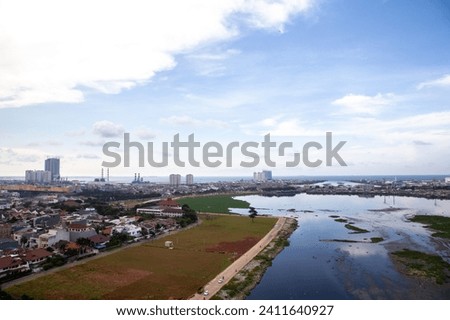 view from above - pluit reservoir, beginning of cleanup Royalty-Free Stock Photo #2411640927