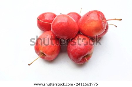 Group of fresh organic ripe red-yellow Dwarf Apple, princess apples,apple, mini apple, small apple,cherry apple, Shiny red apples with green leaf isolated on white backdrop. healthy fruit concept