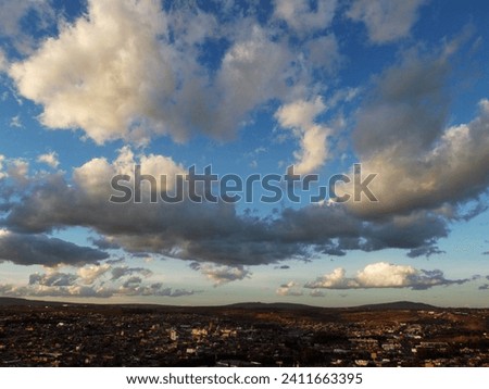 The beauty of the clouds at sunset in the Altos de Jalisco, Mexico Royalty-Free Stock Photo #2411663395