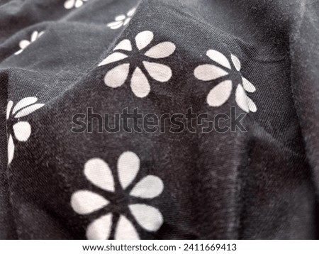 the texture of my black flower clothes