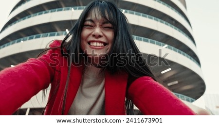 Selfie, woman and outdoor with a smile, buildings and confidence with urban town, memory and social media. Profile picture, Japanese person and girl with happiness, excited and digital app with joy