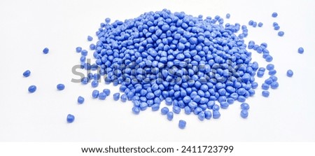 polymer masterbatch granules with color chips isolated on a white background for industrial plastic company banner catalog design products Royalty-Free Stock Photo #2411723799
