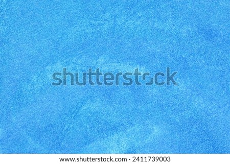 light blue velvet fabric texture used as background. silk color denim fabric background of soft and smooth textile material. crushed velvet .luxury navy blue light tone for silk.